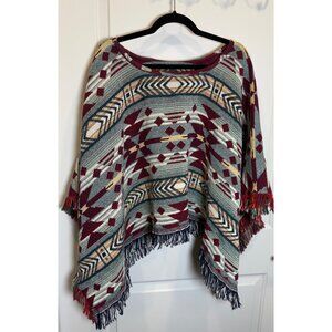Southwestern Pattern Knit Poncho With Fringe Hem
